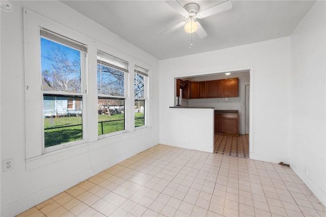 spare room with ceiling fan