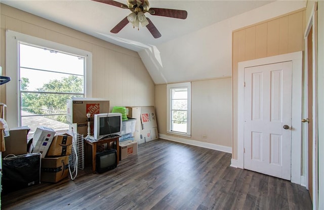 bonus room featuring a wealth of natural light, ceiling fan, dark wood-type flooring, and vaulted ceiling