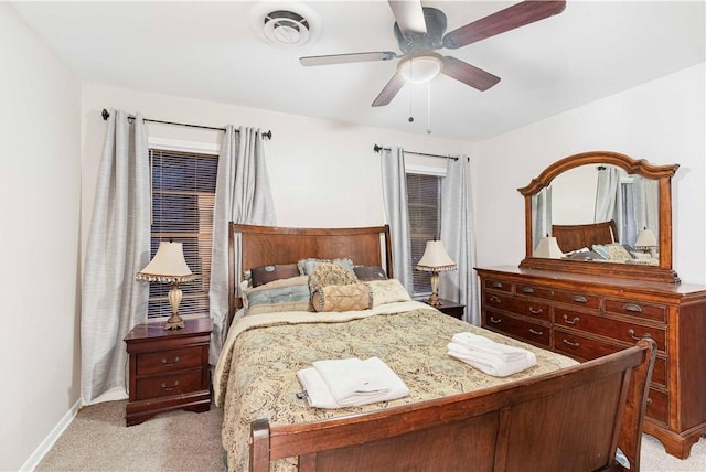 bedroom featuring carpet, visible vents, ceiling fan, and baseboards