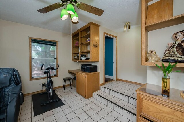 1004 S Magnolia St, Hearne, TX 77859 - office area with ceiling fan and light tile patterned floors