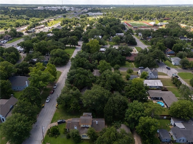 1004 S Magnolia St, Hearne, TX 77859 - aerial view of property and surrounding area featuring nearby suburban area