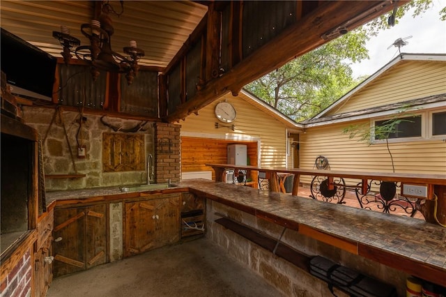 1004 S Magnolia St, Hearne, TX 77859 - view of patio / terrace with a sink and area for grilling