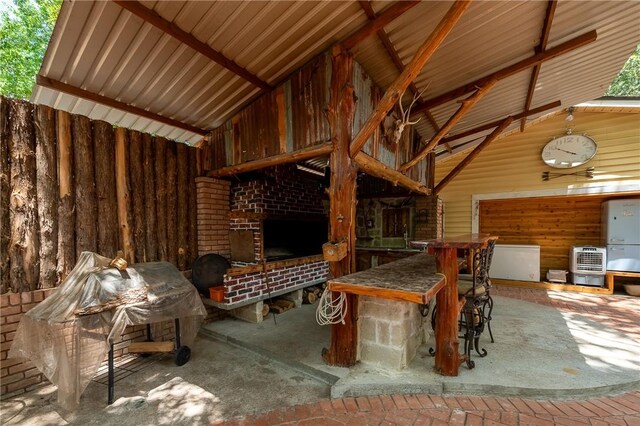 1004 S Magnolia St, Hearne, TX 77859 - unfurnished dining area with a chandelier, hardwood / wood-style floors, ornamental molding, and a textured ceiling