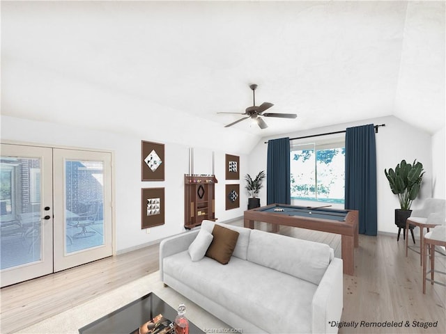 living room with french doors, light hardwood / wood-style flooring, vaulted ceiling, and ceiling fan