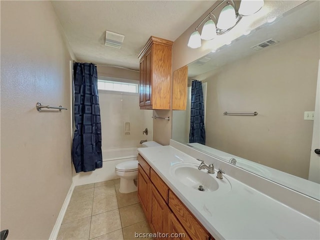 full bathroom featuring tile patterned floors, vanity, toilet, and shower / bathtub combination with curtain