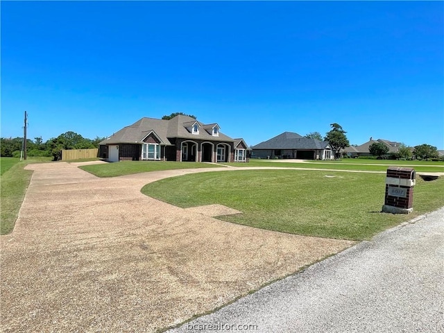 view of front of home with a front yard