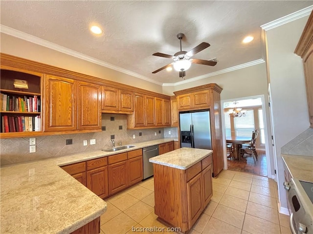 kitchen featuring light tile patterned flooring, a kitchen island, ornamental molding, and appliances with stainless steel finishes