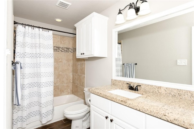 1607 Culture Ln, College Station, TX 77845 - bathroom with shower / tub combo, vanity, toilet, and visible vents