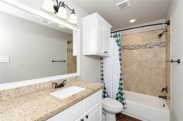 1607 Culture Ln, College Station, TX 77845 - bathroom with vanity, shower / bath combo, toilet, and visible vents