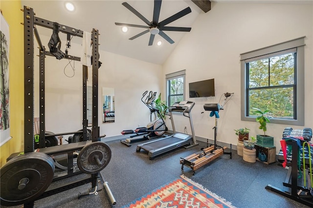 exercise area featuring high vaulted ceiling and ceiling fan