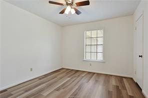 unfurnished room featuring wood-type flooring