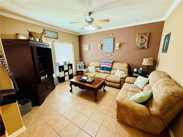living room with crown molding, a ceiling fan, and light tile patterned floors
