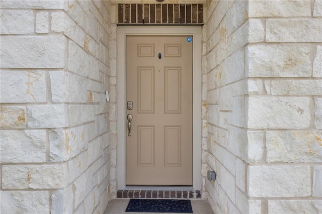 2110 Chief St, Bryan, TX 77807 - property entrance with stone siding