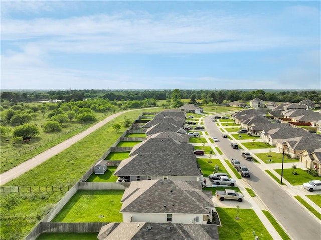2110 Chief St, Bryan, TX 77807 - aerial perspective of suburban area with a tree filled landscape