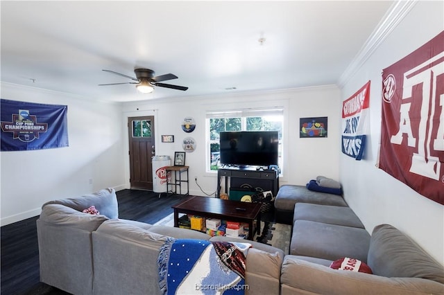 living room with ceiling fan, crown molding, and dark wood-type flooring