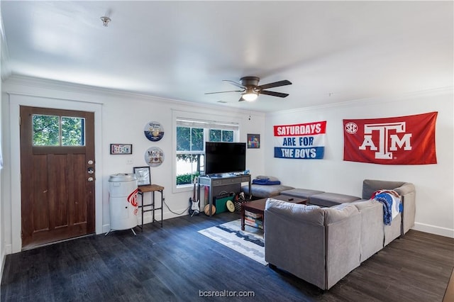 living room with ceiling fan, dark hardwood / wood-style flooring, and ornamental molding