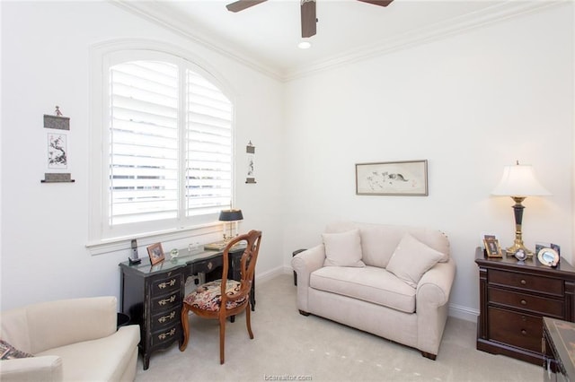 office area featuring crown molding, light colored carpet, a healthy amount of sunlight, and ceiling fan