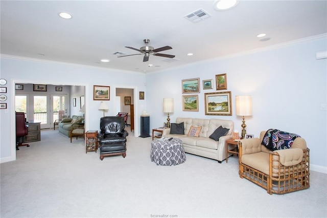 carpeted living room featuring ceiling fan and ornamental molding