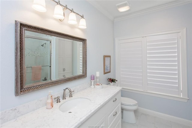 bathroom with vanity, crown molding, a shower, and toilet