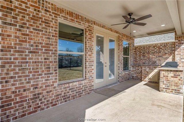 view of patio with ceiling fan and french doors