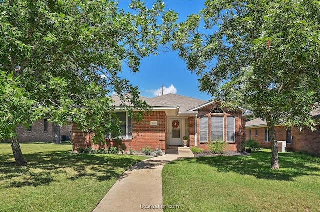 view of front of property with a front yard