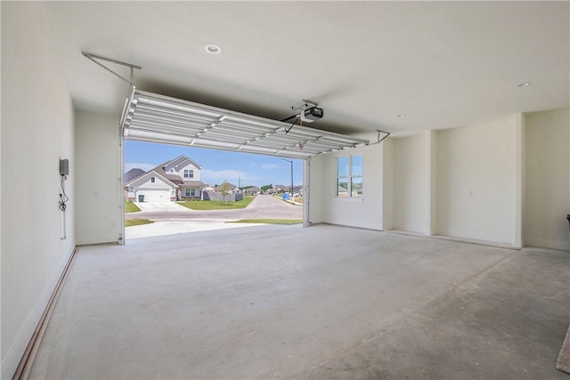 3034 Teller Dr, Bryan, TX 77808 - garage with a garage door opener and a residential view