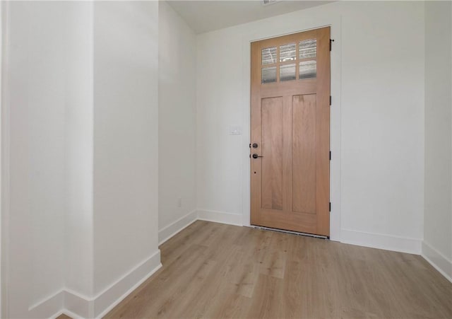3034 Teller Dr, Bryan, TX 77808 - foyer featuring baseboards and light wood-type flooring
