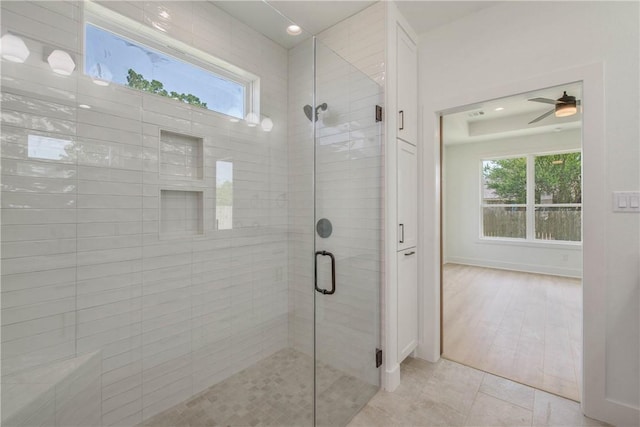 3034 Teller Dr, Bryan, TX 77808 - bathroom with a shower stall, baseboards, recessed lighting, and a ceiling fan