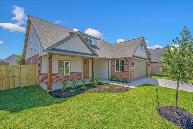 3034 Teller Dr, Bryan, TX 77808 - view of front of home with brick siding, a garage, driveway, and a shingled roof