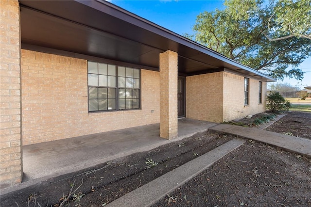 view of home's exterior with a patio area