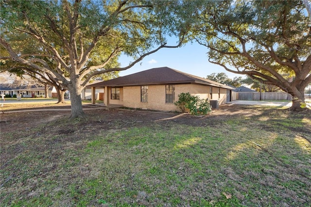 view of property exterior featuring a yard