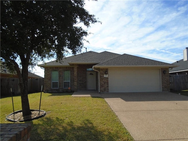 3718 Dove Hollow Ln, College Station, TX 77845 - view of front facade with a garage, concrete driveway, brick siding, and a shingled roof