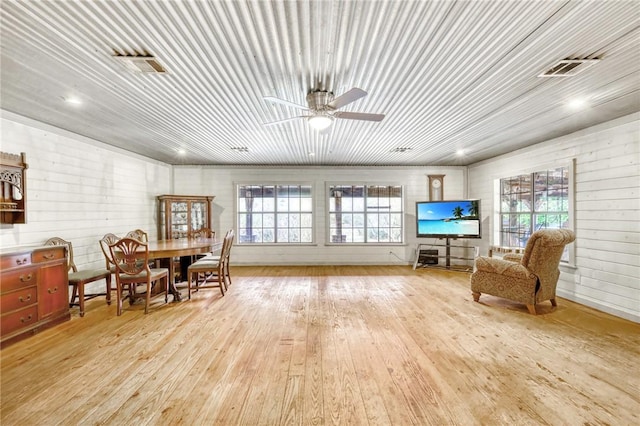 23405 Martha Williams Rd, Montgomery, TX 77356 - dining area with healthy amount of natural light, light wood-type flooring, and a ceiling fan