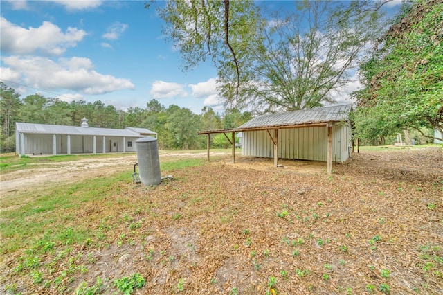 23405 Martha Williams Rd, Montgomery, TX 77356 - view of yard with a pole building and an outdoor structure
