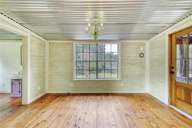 23405 Martha Williams Rd, Montgomery, TX 77356 - unfurnished sunroom with a chandelier and a sink