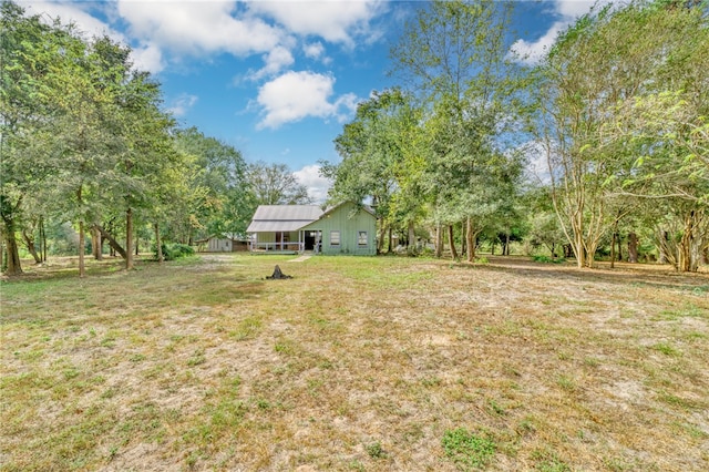 23405 Martha Williams Rd, Montgomery, TX 77356 - view of grassy yard featuring a carport