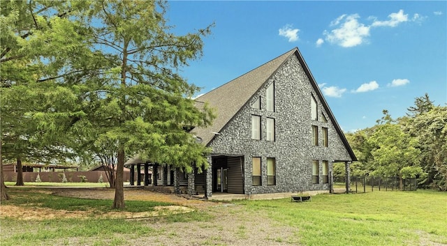 206 22 Hills Rd, Gause, TX 77857 - view of home's exterior featuring stone siding