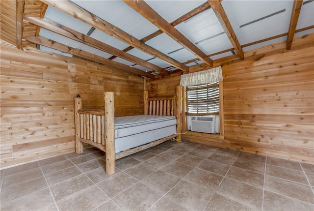 206 22 Hills Rd, Gause, TX 77857 - unfurnished bedroom featuring wooden walls, tile patterned flooring, and cooling unit