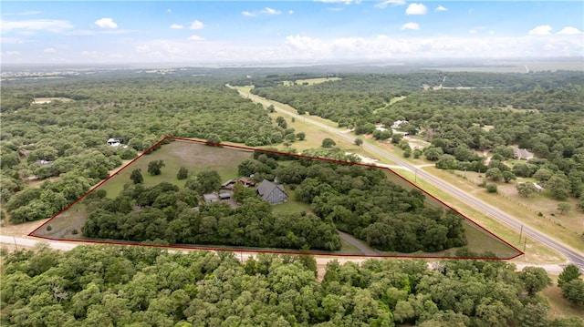 206 22 Hills Rd, Gause, TX 77857 - aerial view of property and surrounding area featuring a heavily wooded area and property parcel outlined