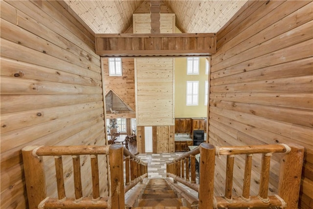 206 22 Hills Rd, Gause, TX 77857 - sitting room featuring wood walls and lofted ceiling