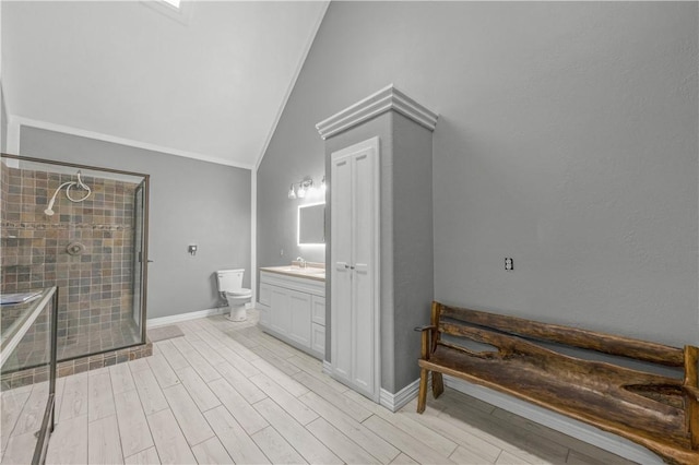 206 22 Hills Rd, Gause, TX 77857 - bathroom featuring vaulted ceiling, vanity, a stall shower, wood finished floors, and crown molding