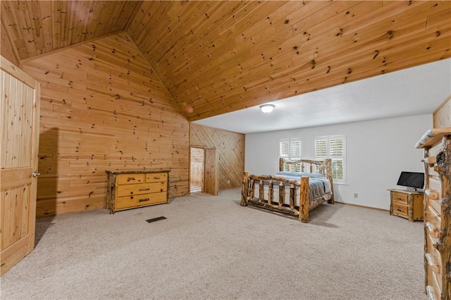206 22 Hills Rd, Gause, TX 77857 - bedroom featuring wooden walls, wooden ceiling, high vaulted ceiling, and carpet flooring