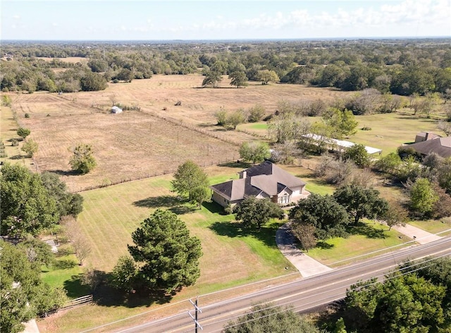 birds eye view of property featuring a rural view