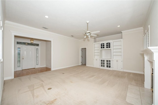 unfurnished living room featuring light carpet, ceiling fan, and ornamental molding