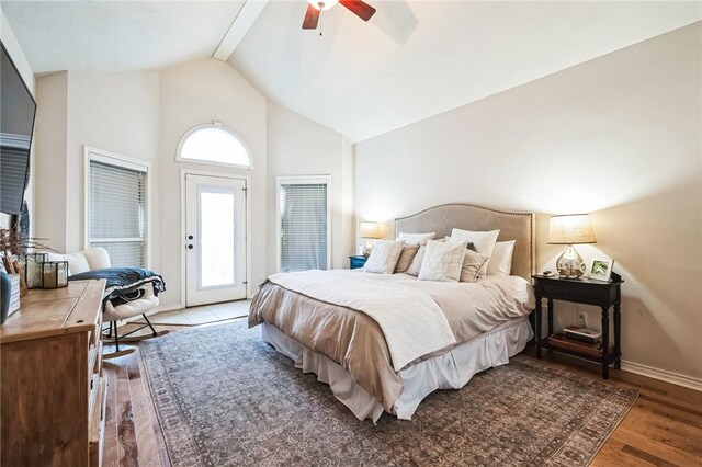 bedroom featuring high vaulted ceiling, access to outside, wood finished floors, baseboards, and ceiling fan