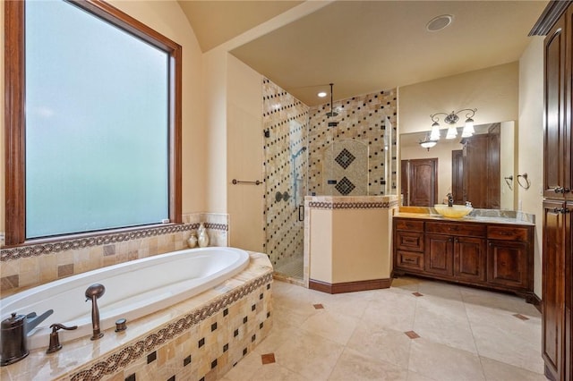 bathroom featuring a shower stall, tile patterned flooring, vanity, and a bath