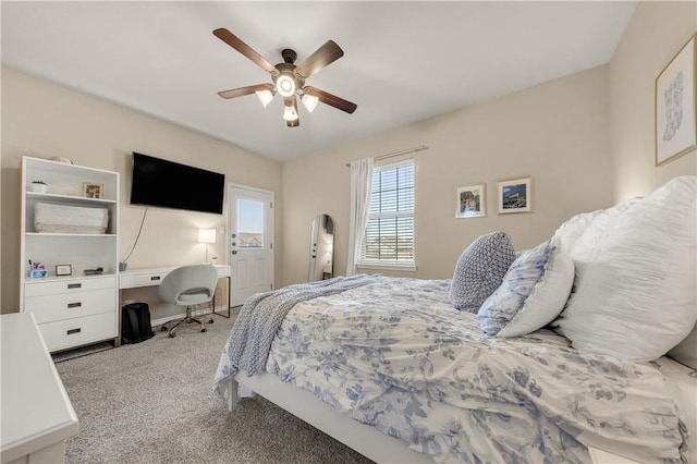 carpeted bedroom featuring ceiling fan