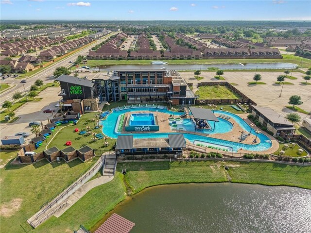 3314 Airborne Ave, College Station, TX 77845 - drone / aerial view of a pool and a nearby body of water
