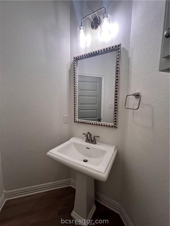 bathroom featuring hardwood / wood-style flooring