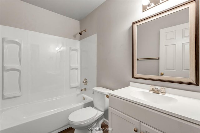 full bathroom with shower / tub combination, vanity, and toilet